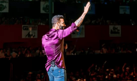 Gusttavo Lima leiloa violão para ajudar vítimas do RS